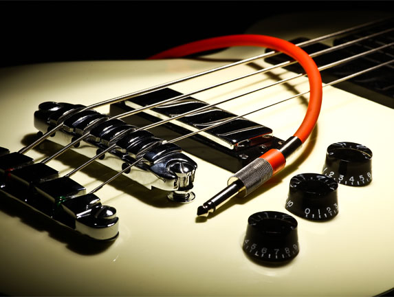Electrical Guitar And A Red Cord